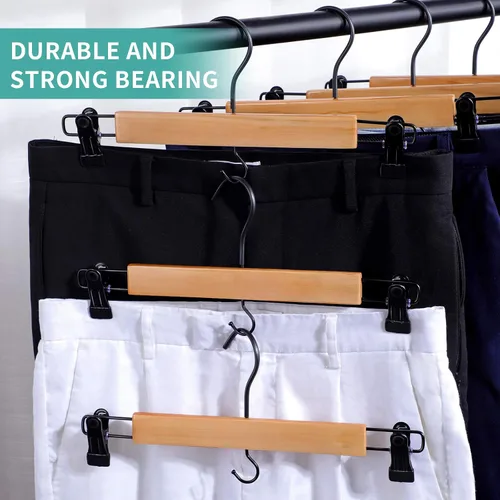 Vista 7 de Perchas de madera prémium para pantalones, paquete de 10 perchas para faldas con dos clips de agarre seguro, gancho giratorio con cancelación