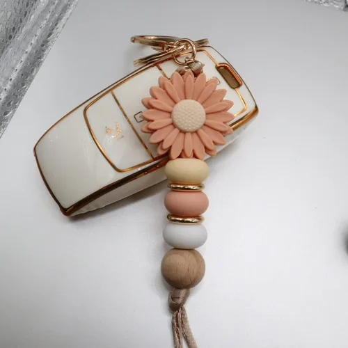 Vista 4 de MyfavoriteK Llavero de silicona con cuentas de flores para mujer, bonito llavero para llaves de coche, bolso, mochila, adorno