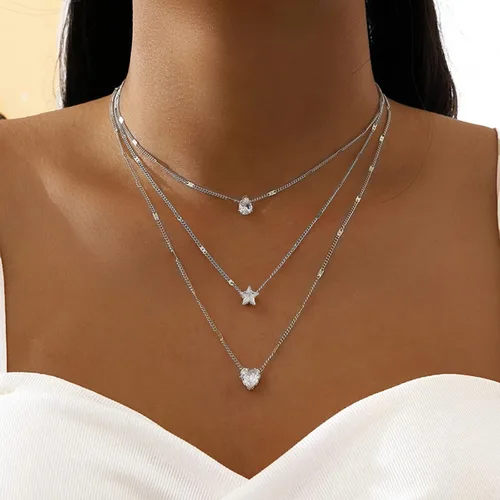Vista 2 de YienDoo Collar de cristal con capas de estilo bohemio, gargantilla de lágrima de cristal, corazón, gotas de agua, estrella, collar multicapa dorado
