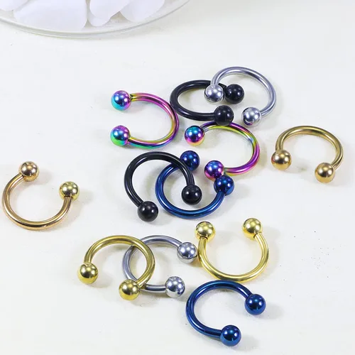 Vista 4 de Kridzisw 24 anillos de acero quirúrgico de 12 G con cuentas cautivas para la nariz tabique ceja labio pezón lengua ombligo joyería para mujeres