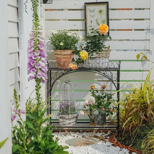 Vista 3 de Estante largo negro de doble capa, soporte de metal estilo patio francés para plantas altas en maceta, soporte resistente para macetas interiores