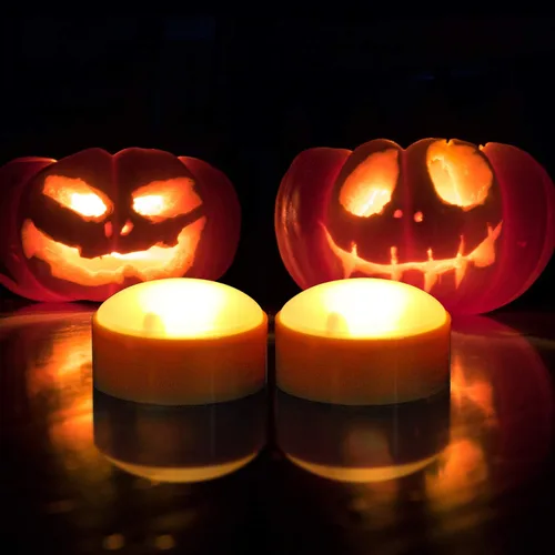 Vista 3 de Paquete de 2 luces LED de calabaza de Halloween con control remoto y temporizador, color naranja, parpadeante, funciona con pilas, velas eléctricas