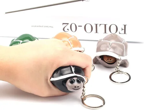 Vista 3 de 2 piezas de llavero de tortuga, juguete elástico de silicona para aliviar el estrés y la ansiedad, juguete para Halloween, abril, tontos, fiesta