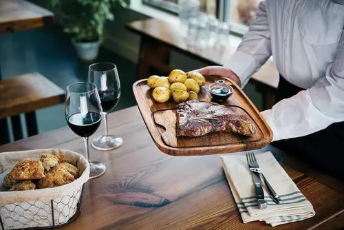 Vista 4 de Ironwood Gourmet Fort Worth Plato para Bistec con Canal para Jugos, Madera de Acacia, Juego de 4