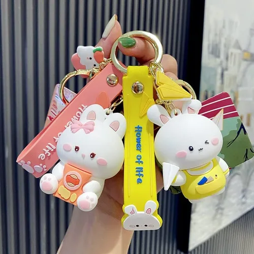 Vista 8 de BEXOA Lindo llavero de regalo de Navidad Llavero de conejo Kawaii de Año Nuevo para niños y niñas, mochila con dijes para mujeres y hombres