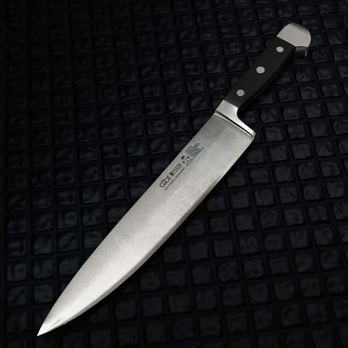 Vista 5 de Güde Alpha Series Cuchillo de chef forjado a mano/afilado con mango Hostaform negro de 10 pulgadas, fabricado en Solingen, Alemania desde 1910