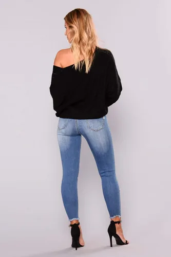 Vista 5 de Jeans de tiro alto y ajustados para mujer, diseño elástico y rasgado