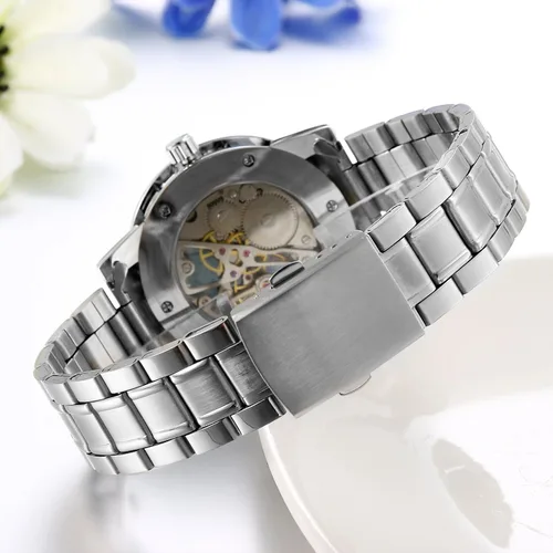 Vista 3 de Jewelrywe - Reloj de pulsera mecánico para hombre y hombre, esfera azul esqueleto, correa de acero inoxidable, mecanismo de viento a mano