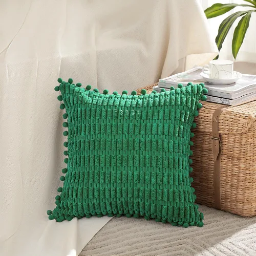 Vista 2 de Fancy Homi Paquete de 2 fundas de almohada decorativas de color verde de 22 x 22 pulgadas con pompones para sofá, dormitorio, sala de estar