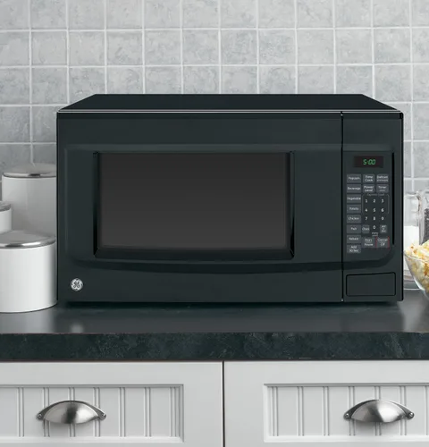 Vista 2 de GE Horno microondas de encimera de 1.4 pies cúbicos Negro
