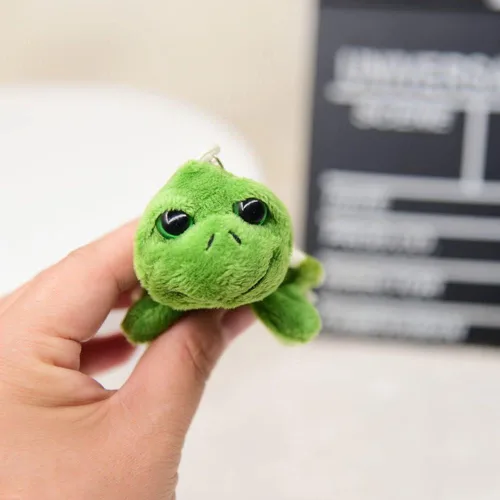 Vista 6 de Jowxsx Mini criaturas marinas verde tortuga muñeca llavero regalo peluche llavero de dibujos animados bolsa colgante auto animal decoración coche