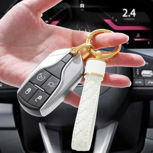 Vista 5 de Llavero de cuero para automóvil, llaveros tejidos hechos a mano para mujeres y hombres, soporte universal para llavero con rotación de 360 grados