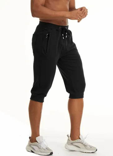 Vista 3 de MAGCOMSEN Pantalones capri deportivos 34 para hombre con bolsillos con cremallera, longitud a la rodilla, pantalones cortos de entrenamiento