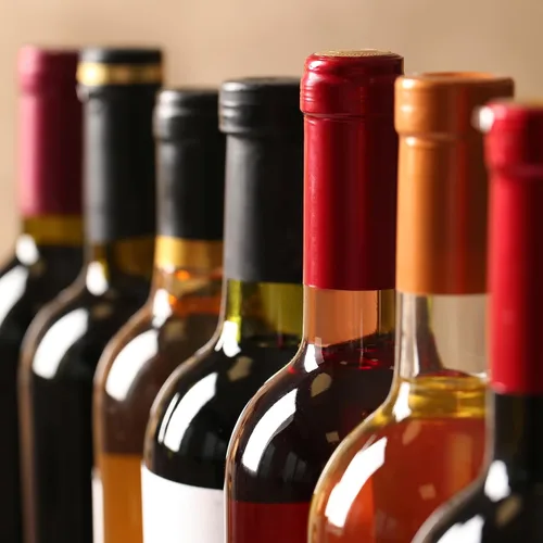Vista 4 de uxcell 100 cápsulas termorretráctiles de PVC, cápsulas para botellas de vino, tapa retráctil, cubierta superior retráctil para bodegas y cocina Negro