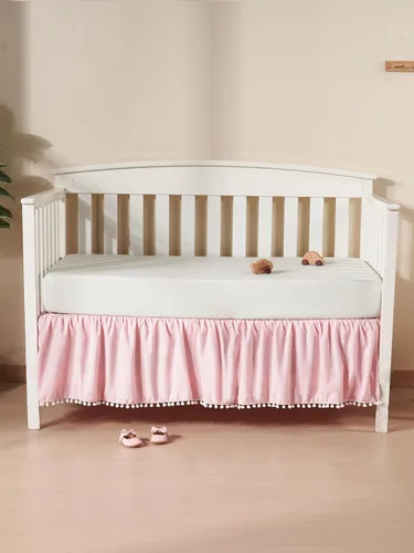 Vista 6 de TILLYOU Falda de cuna de bebé para niñas y niños, falda de cama con volantes con pompones, 28 x 52 pulgadas, caída de 14 pulgadas, rosa