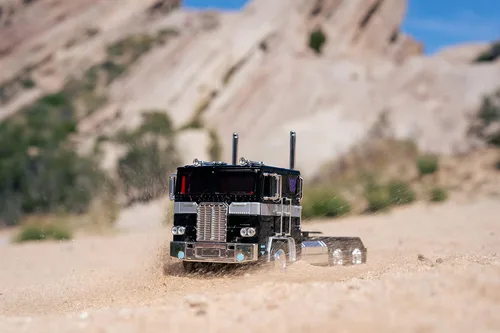 Vista 7 de Jada Toys Transformers G1 1:24 Nemesis Prime - Coche fundido a presión, juguetes para niños y adultos, color negro