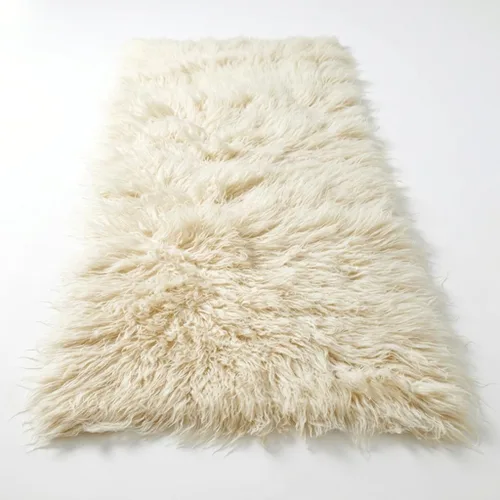 Vista 3 de Elegantes alfombras griegas flokati. Pelo suave y esponjoso de 3 pulgadas. 100% lana natural. Alfombra moderna de color blanco roto lanudo