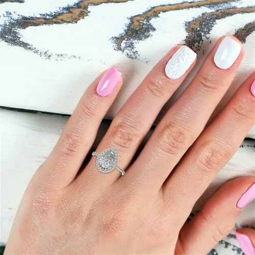 Vista 6 de Anillo de compromiso de diamantes con halo superior y lateral de corte de pera blanca de 2.75 quilates con certificación IGI en oro rosa amarillo