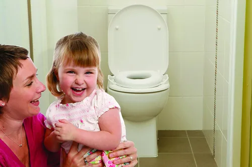 Vista 3 de Dreambaby Asiento de inodoro para orinal, acolchado suave con asas de agarre, color blanco, modelo L674