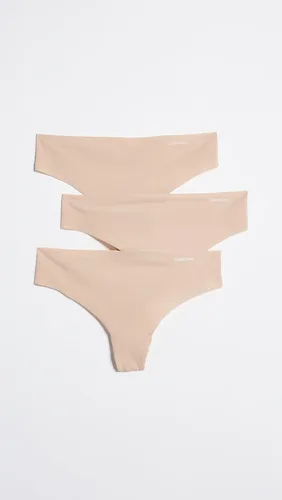 Vista 3 de Calvin Klein Women's Invisibles Seamless Thong Panties, 3 Pack