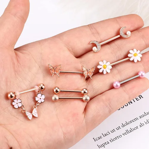 Vista 4 de BESTEEL 7 pares de anillos de pezón de 14 G para mujer acero quirúrgico para pezón joyería de circonita cúbica mariposa margarita flor lengua barra