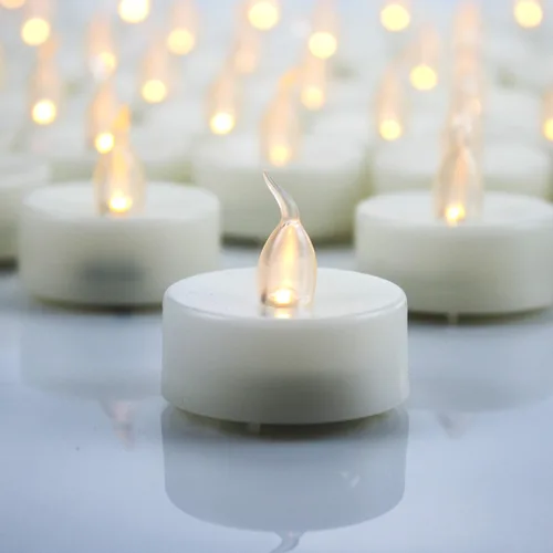 Vista 10 de Velas votivas sin llama con pilas, luces de té LED, luz blanca, 12 unidades Blanco