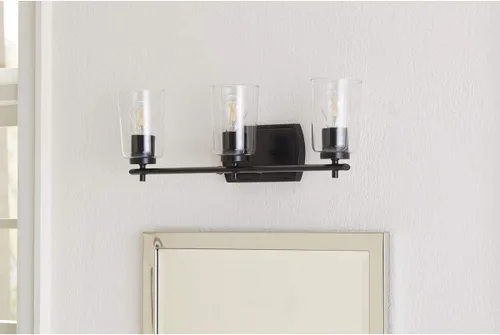 Vista 3 de Progress Lighting Adley Collection - Lámpara de tocador de baño tradicional con 3 luces, de cristal transparente, color negro mate, 7-5/8 x 23 Mate
