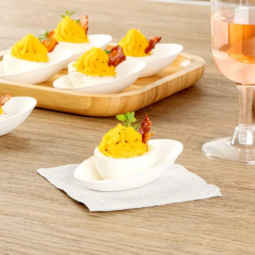 Vista 3 de Restaurantware Platos de degustación sin PFAS añadido de 3.2 x 2.1 pulgadas, 100 platos desechables, compostables para el hogar, aptos