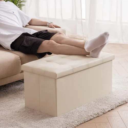 Vista 5 de YOUDENOVA Otomana plegable de almacenamiento, otomana de piel sintética, reposapiés otomano, asiento acolchado para dormitorio y sala de estar, Beige