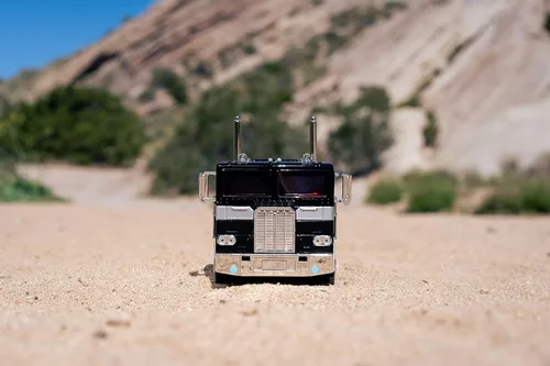 Vista 9 de Jada Toys Transformers G1 1:24 Nemesis Prime - Coche fundido a presión, juguetes para niños y adultos, color negro