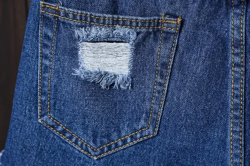 Vista 6 de Swbreety Pantalones cortos de mezclilla elásticos con dobladillo deshilachado y cintura alta para mujer