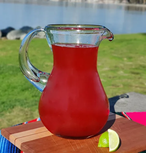 Vista 4 de Jarra mexicana de vidrio soplado a mano, diseño transparente natural (84 onzas)