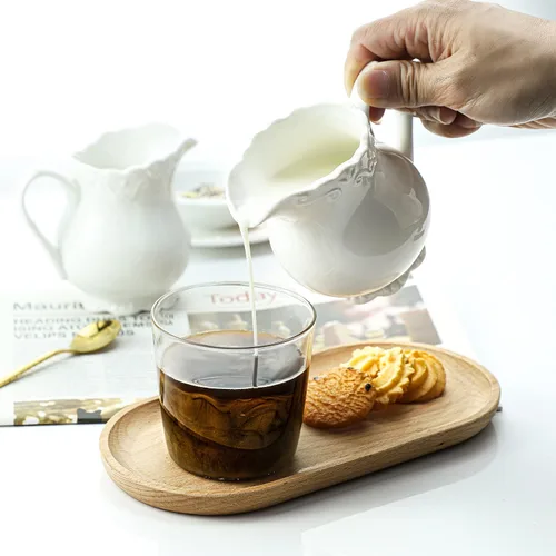 Vista 3 de Crema de cerámica blanca pura vintage con asa, jarra de crema de leche de café de 6 onzas
