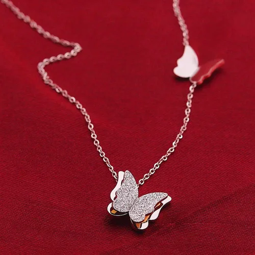 Vista 3 de Pendientes de mariposa de acero inoxidable esmerilados chapados en oro rosa de 18 quilates para mujer