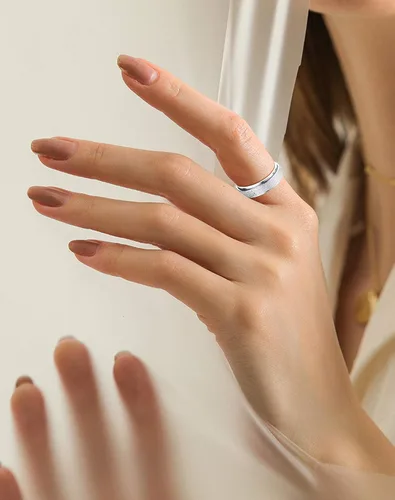 Vista 3 de Jstyle Juego de 4 anillos giratorios de acero inoxidable para mujeres y hombres, anillos giratorios con flores, luna, estrella, anillos geniales