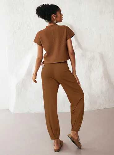 Vista 2 de MEROKEETY Conjunto de dos piezas para mujer, suéter de punto, sin botones, pantalones de cintura alta, conjunto de chándal
