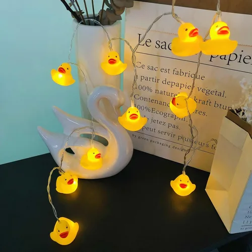 Vista 2 de Linda cadena de luces de pato para interiores, funciona con pilas, luces de decoración de pato blanco cálido amarillo para el hogar, dormitorio