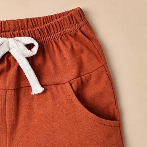Vista 9 de Ropa para bebé niño pequeño, trajes de verano de manga corta, camiseta de retazos y pantalón con bolsillo, conjunto de 2 piezas, 12 meses a 4 años
