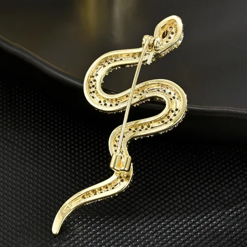 Vista 4 de Broches dorados de serpiente para mujeres y hombres, alfileres de solapa esmaltados de serpiente, accesorios de diamantes de imitación, poderosos