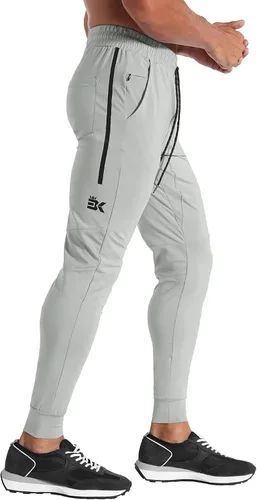 Vista 20 de BROKIG Pantalones deportivos ligeros para hombre, elásticos, de secado rápido, con bolsillos con cremallera