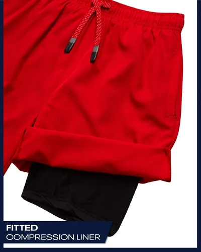 Vista 4 de Reebok Pantalones cortos de baloncesto 2 en 1 con forro de compresión y bolsillos, pantalones cortos deportivos para niños para gimnasio y correr