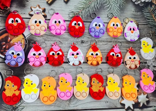 Vista 2 de 24 paquetes de huevos a granel pollos mochila llavero mini pop Fidget fiesta Pascua regalos escuela estudiantes premios burbuja