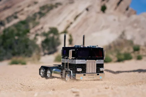 Vista 8 de Jada Toys Transformers G1 1:24 Nemesis Prime - Coche fundido a presión, juguetes para niños y adultos, color negro