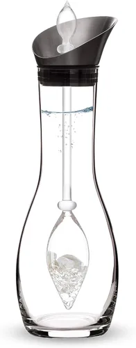 Vista 22 de VitaJuwel Era Five Elements Jarra de agua de cristal con amatista · Calcedonia · Madera petrificada · Cuarzo rosa y ágata Alineación · Puesta a