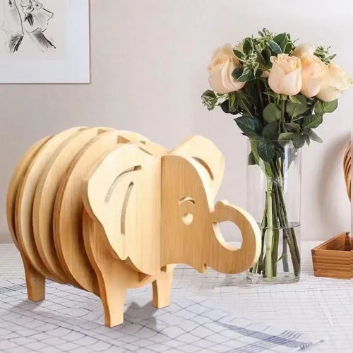 Vista 3 de Juego de 8 alfombrillas de cocina empalmes de elefante 3D empalmable, resistencia al calor, almohadillas calientes de bambú creativas