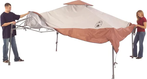 Vista 3 de Coleman 13x13ft Instant Canopy Sun Shelter Portable Shade Tent Sets Up in 3 Minutes Vented Roof for Airflow Great for Campsite Backyard Tailgates