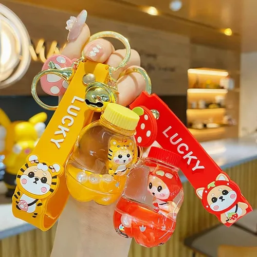 Vista 2 de BEXOA Bonito llavero de regalo Dijes de mochila Kawaii de dibujos animados Shiba Inu líquido flotante para niños y niñas llaveros para mujer