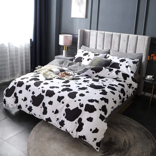Vista 2 de Juego de ropa de cama de dibujos animados para niños, funda de edredón con estampado de vaca, funda de edredón negra y blanca, funda de edredón