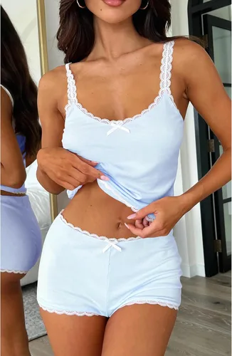 Vista 2 de RUEWEY Conjunto de pijama con tirantes delgados para mujer, con ribete de volantes, camiseta corta y pantalones cortos, conjunto de lencería de 2