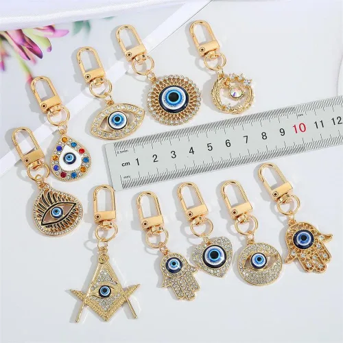 Vista 3 de Hamsa Llavero de mano con diseño de mal de ojo para coche, Cabalá, buena suerte, protección de paredes, bolsos, joyería